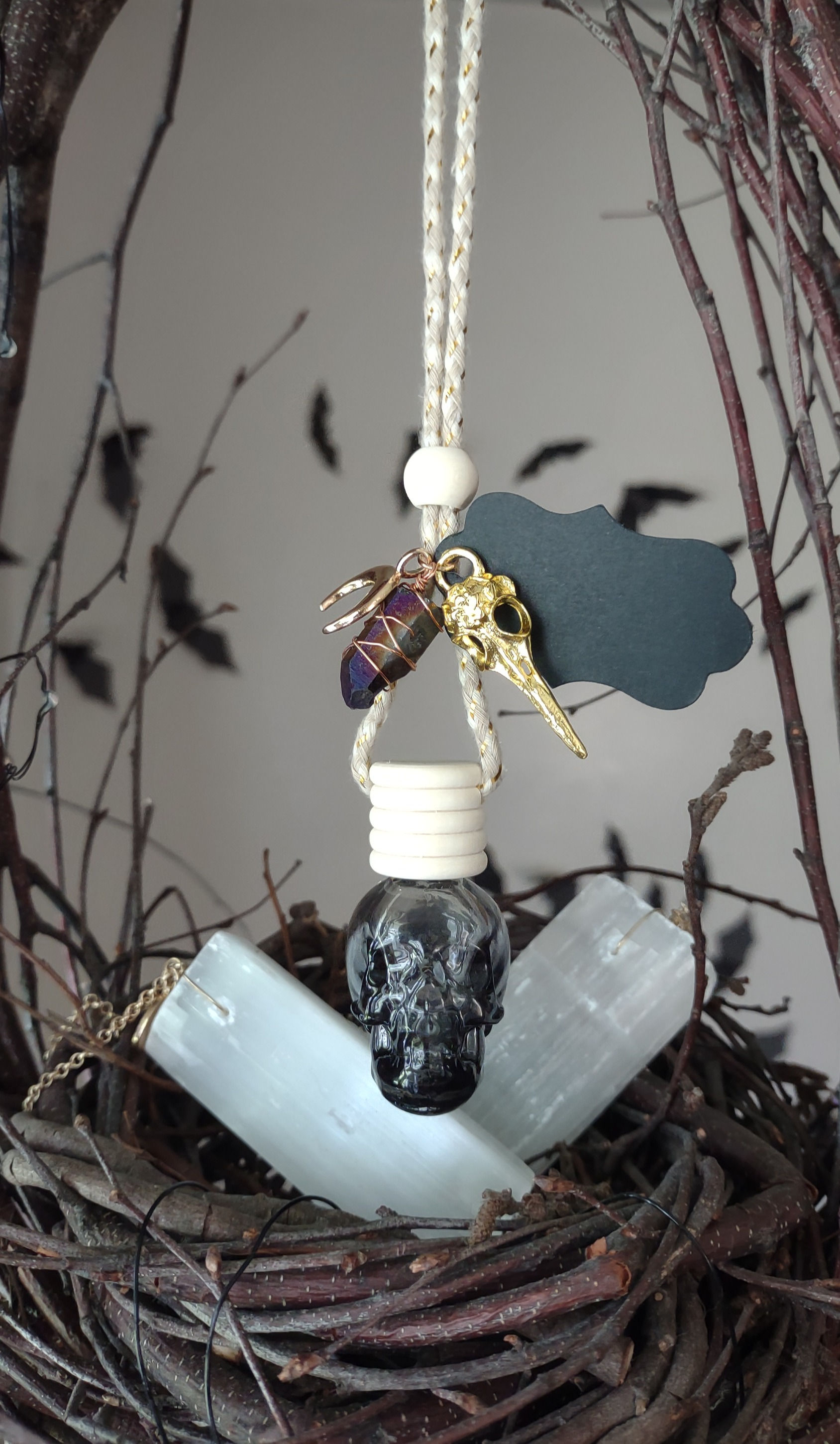 Egyptian Dragon Scented Skull Diffuser With A Raven Skull and Purple Titanium Quartz Crystal
