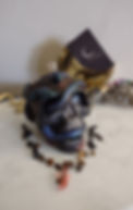Nocturnal Designs most popular candle, Lilith's Seduction, a skull candle with snakes wrapped around it.