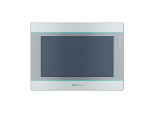 The image shows a modern, sleek electronic device that appears to be a wall-mounted touchscreen panel. The device has a large rectangular screen with a silver frame. On the right side of the screen, there are three small icons or indicators arranged vertically. The bottom of the frame has the brand name "Vicon" printed on it. This device is likely used for home automation, security, or intercom purposes.