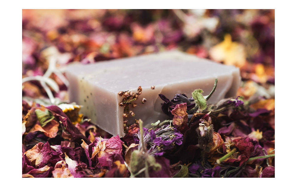 Thumbnail: Aside view of this purple soap on a bed of dried flower petals.