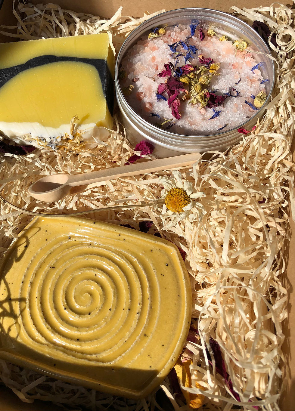 Thumbnail: A yellow, black and white soap , yellow soap dish and a ti of bath salts.