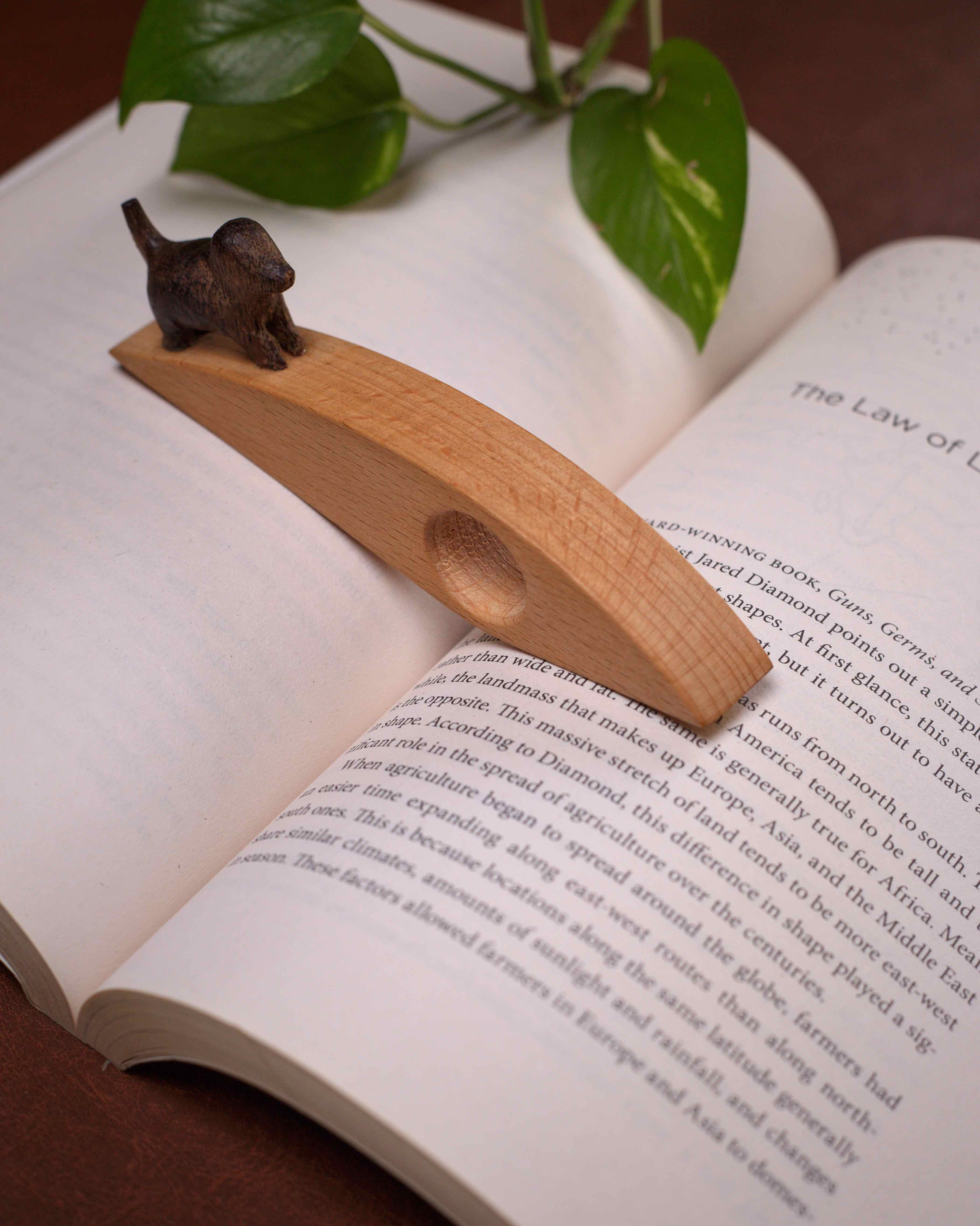 Watch the dog book thumb stopper