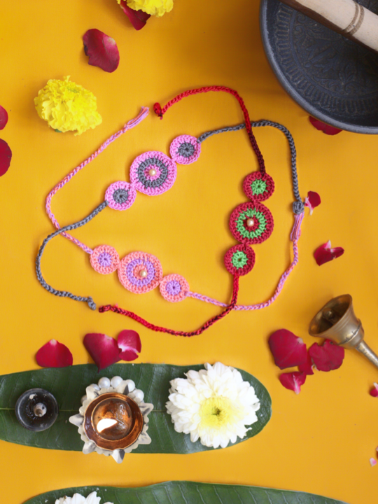 Thumbnail: रंगोली Crocheted Rakhi - Set of 3