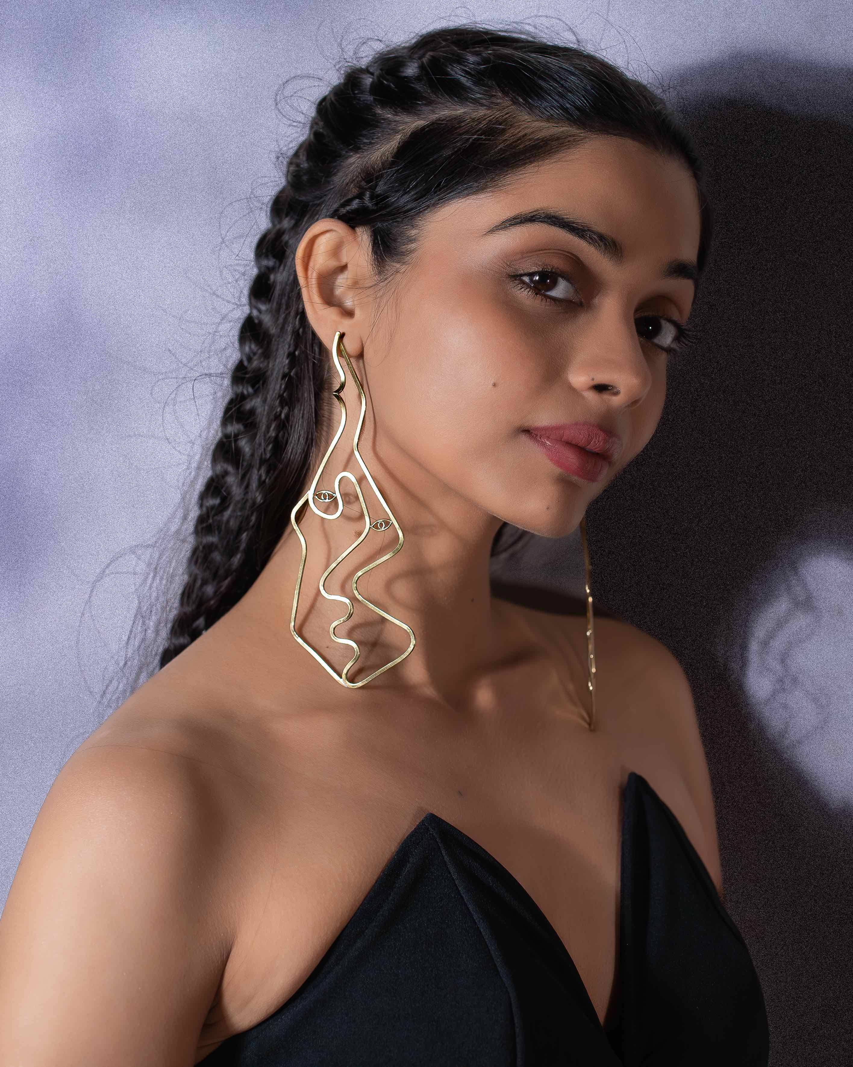 Faces brass earrings