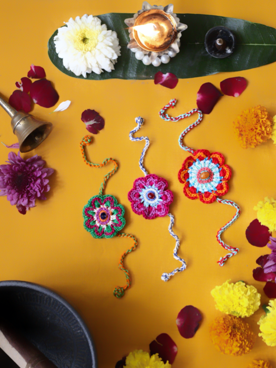 Thumbnail: कन्द पुष्प Crocheted Rakhi - Set of 3