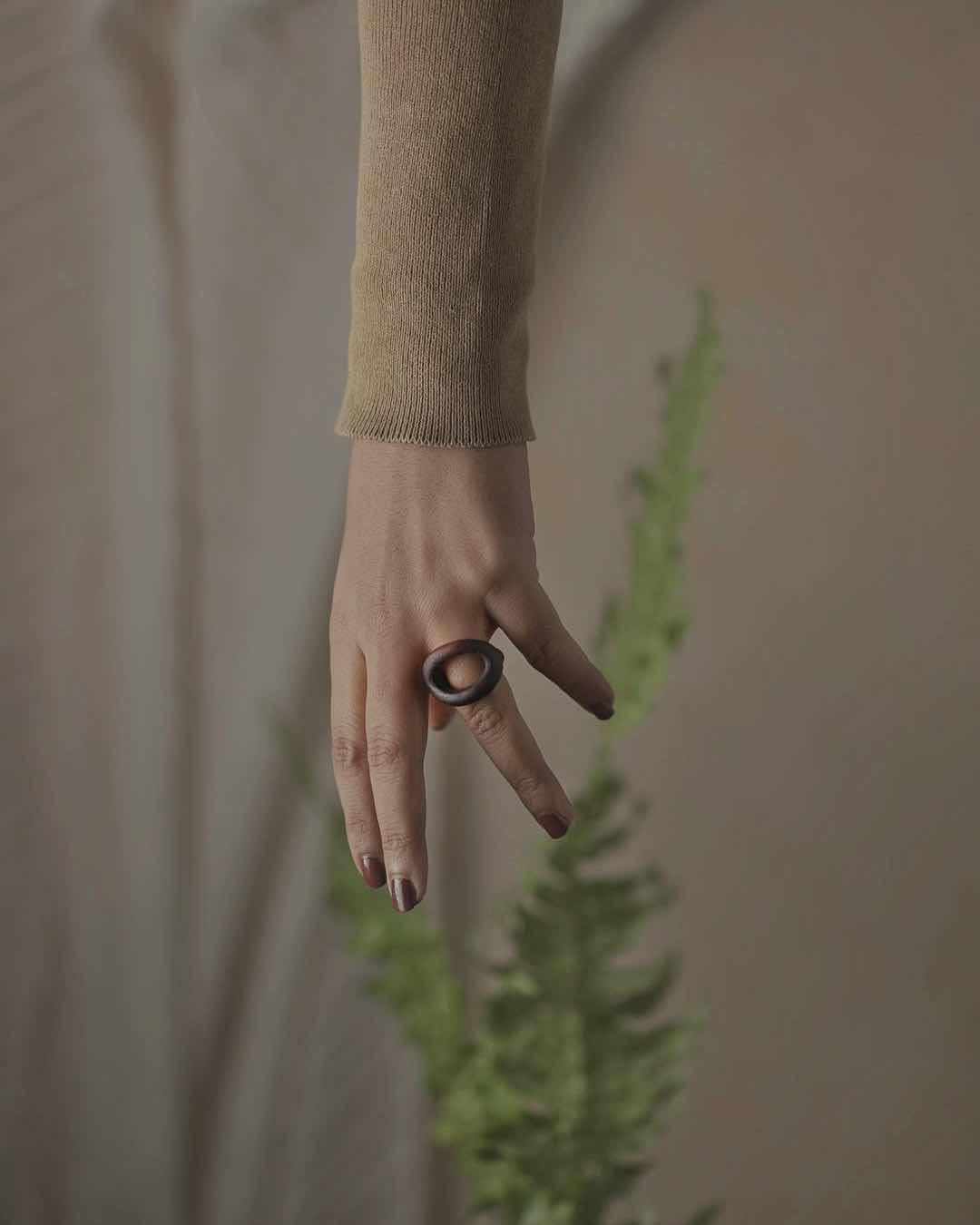 Peek-a-boo hand-carved ring