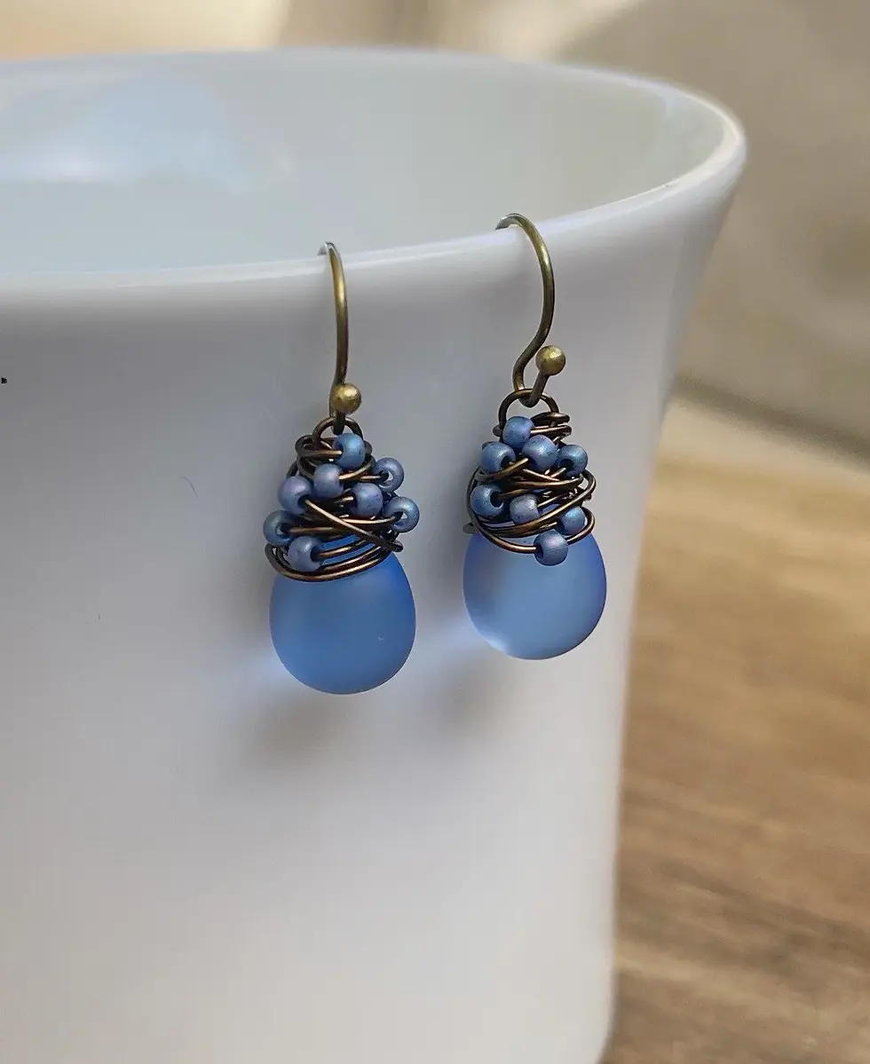 Thumbnail: Periwinkle Blue Sea Glass Earrings, Desert Flower Wrapped in Antiqued Brass