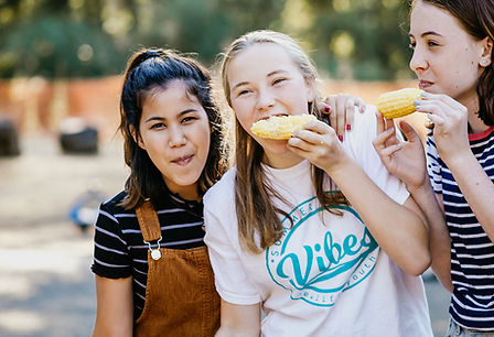 Girls Eating at The Festival of Tents