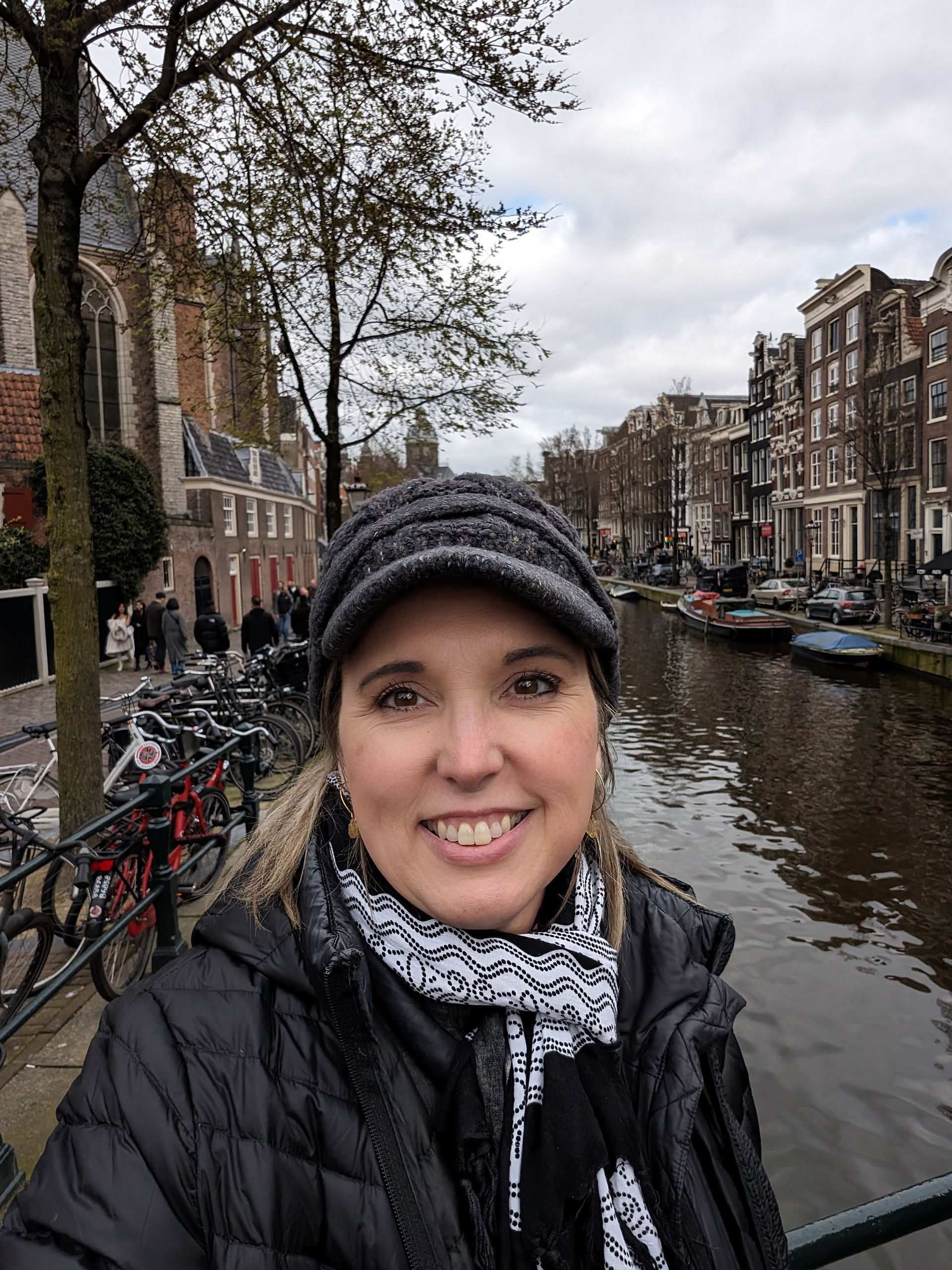 woman standing in front of canals