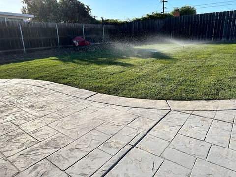 stamped concrete patio installed in San Diego by Johns Lawn and Garden