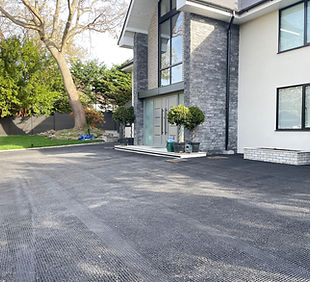 structural reinforcement mesh laid on open grade tarmac.jpg