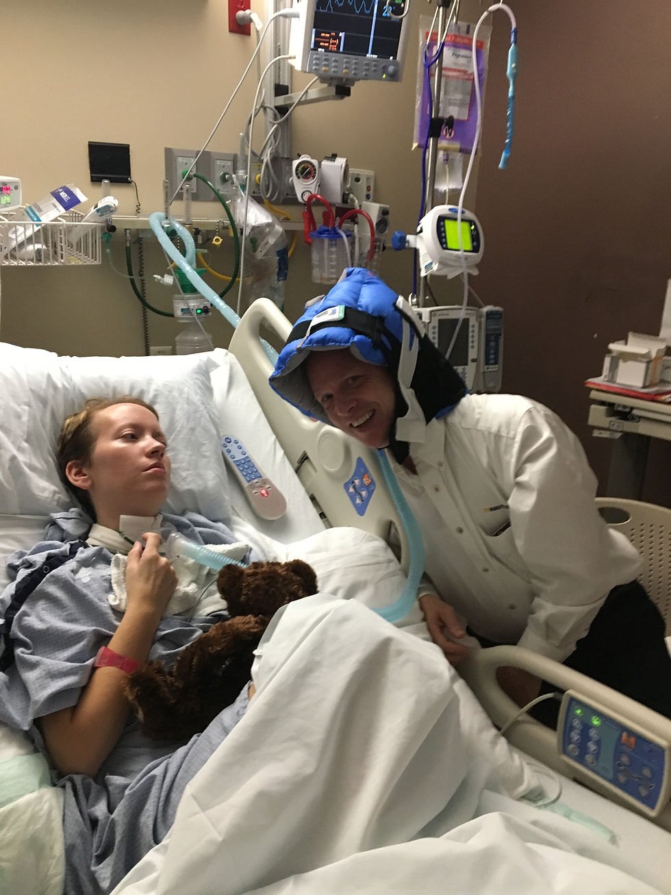 Dale was trying to make Brianne laugh by putting on her foot brace! Not even a smirk!!