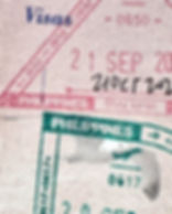 Tampons d'entrée et de sortie des Philippines visibles sur une page de passeport
