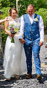 Bride and groom with bouquet