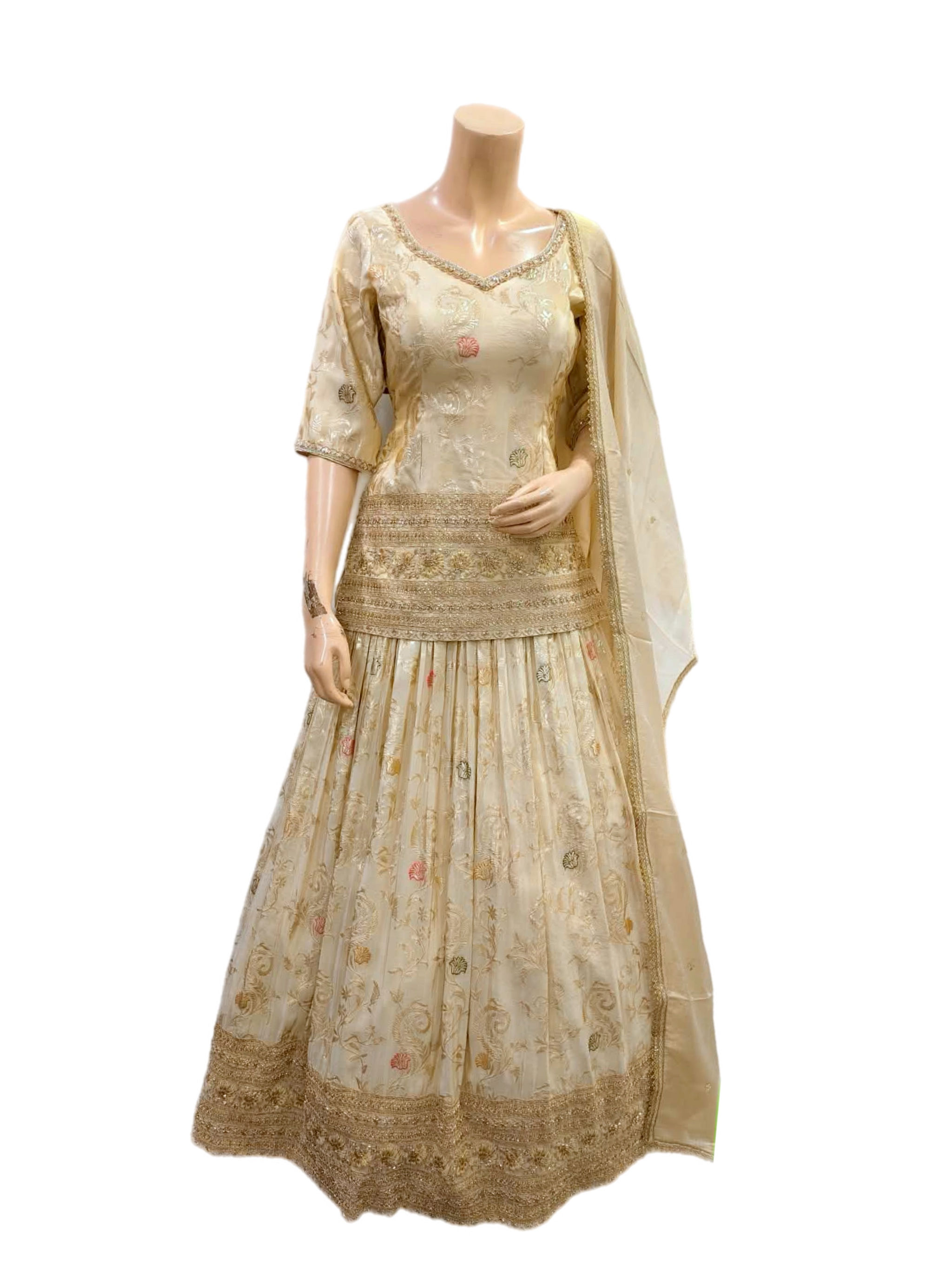 Classy Champagne Color Embroidered Woven Silk Lehanga with Long Top