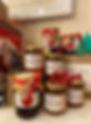 miele dell'azienda agricola Bagolé e marmellate di Mete Aperte esposte per le offerte natalizie