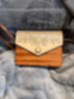 Wood purse leaves