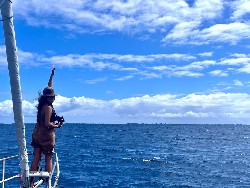 Crew-mate Elisenda at the bow on bommie watch crossing the atoll
