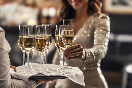 waitress serving wine