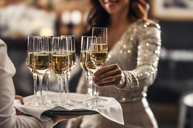 waitress serving wine