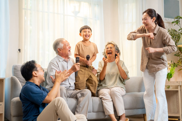 Family enjoying music from a Sonos system in multiple rooms