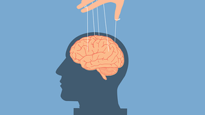 A hand is using a brain like a puppet