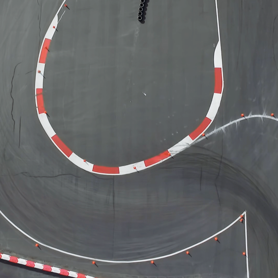 Car on racetrack from Filmkraft's Michelin branded documentary