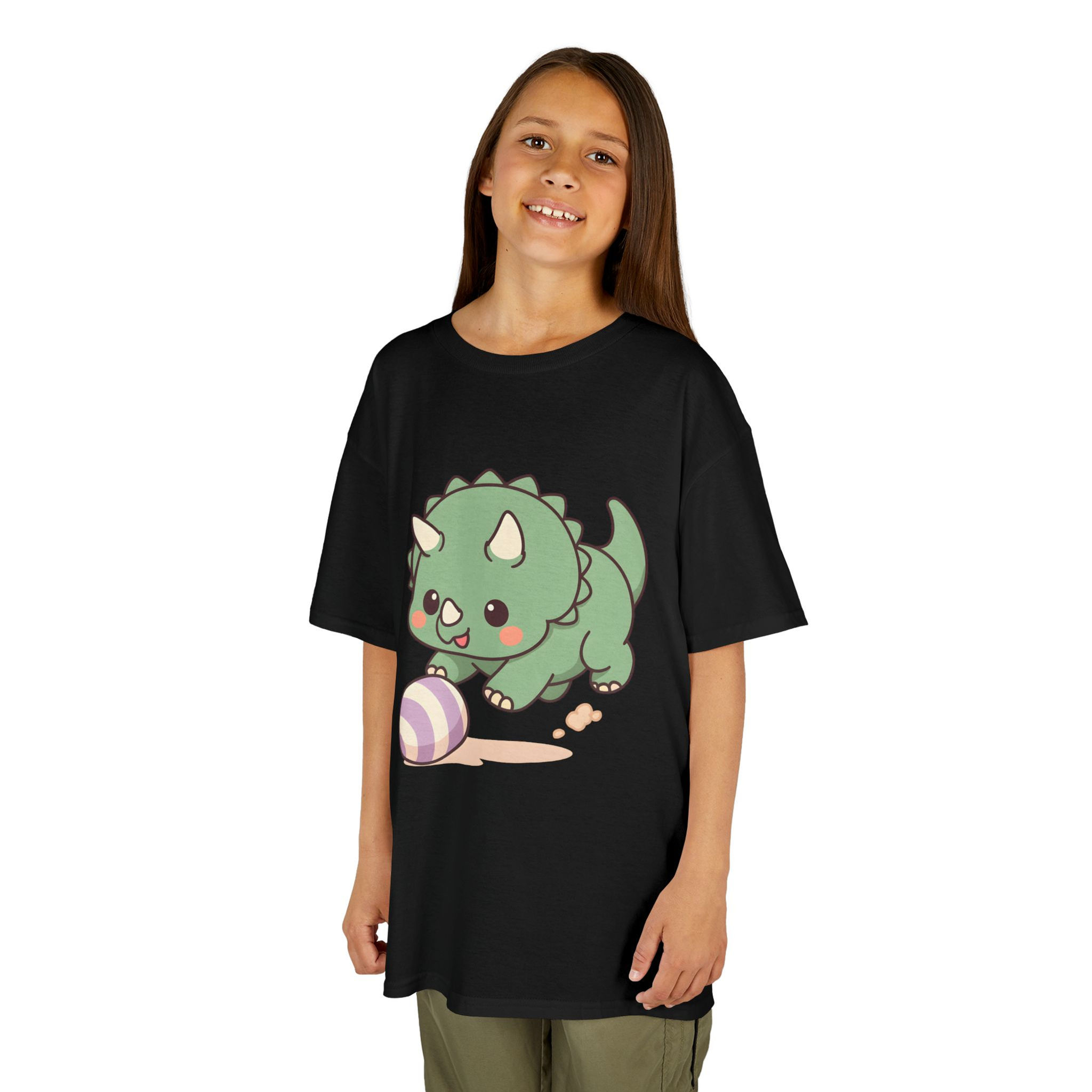 kawaii cartoon triceratops playing with a ball on a t-shirt