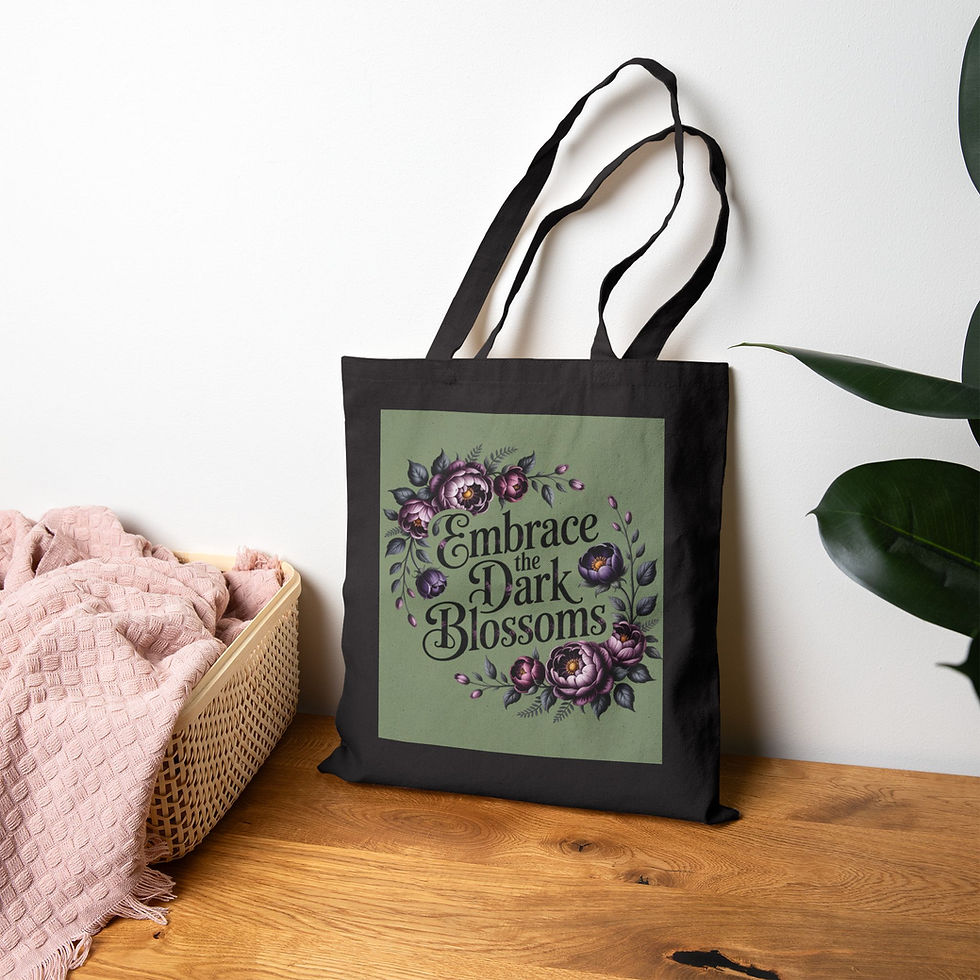 tote bag with purple flowers and deep green leaves around elegant text Embrace the Darkness on rich green background
