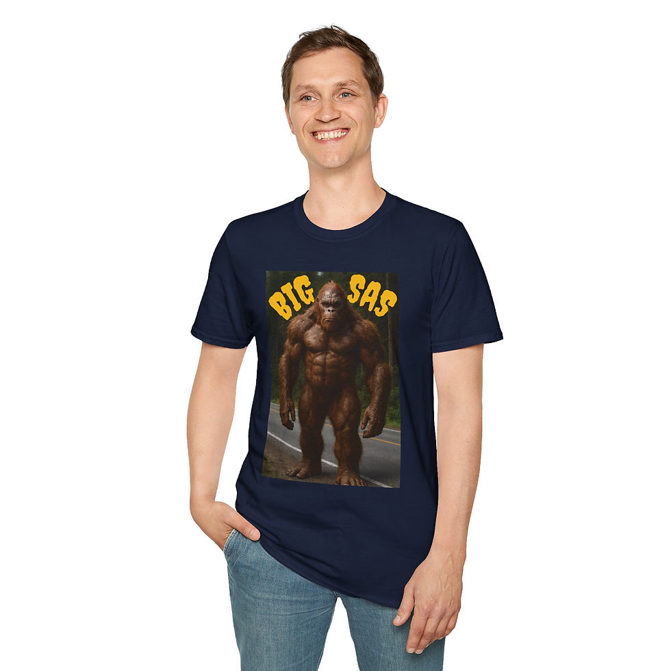Thumbnail: Bold text Big Sas with a large muscular Sasquatch along a road on a t-shirt