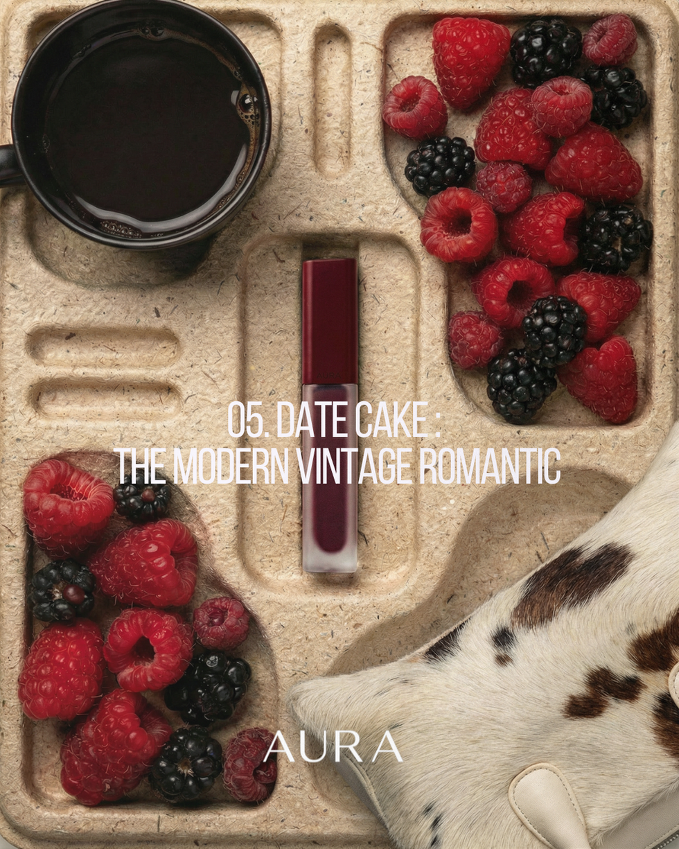 Lipstick and berries on textured surface with coffee.