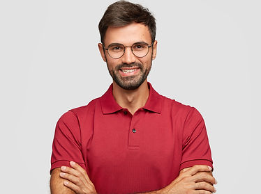 happy-confident-male-entrepreneur-with-postive-smile-has-beard-mustache-keeps-arms-folded-