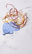 Abstract brain with tangled cords - Health Anxieties: Heightened fear and anxiety related to health, impacting decision-makin