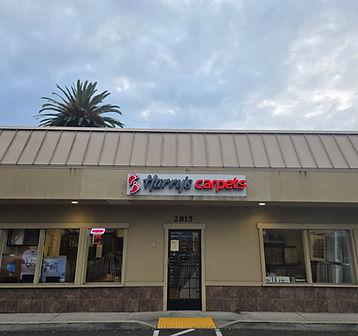 Harry's Carpets Napa boutique on Jefferson St next to Dutch Bros. Shop premium hardwood, waterproof LVT, and designer carpets