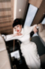 Jessica Minh Anh in white AI Generated couture look by UAE fashion house MAGNO MONTERO on the GoldenPass Express Prestige Class for Luxury in Motion campaign