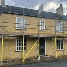 Building with scaffolding up during restoration