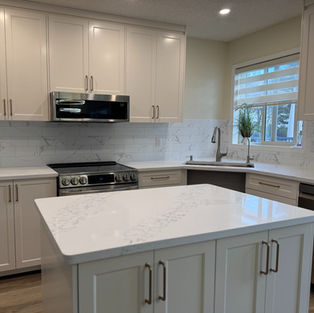 Residential kitchen renovation with custom cabinets and undermount sink installation by Eztech in Calgary