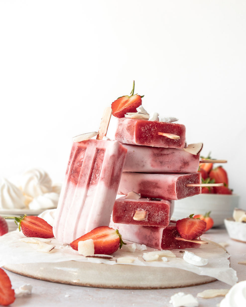 Ice lolly eton mess with cocconut whipped cream, strawberry and meringue