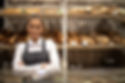 portrait-of-bakery-seller-with-arms-cros