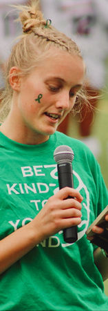 Female athlete speaking into a microphone