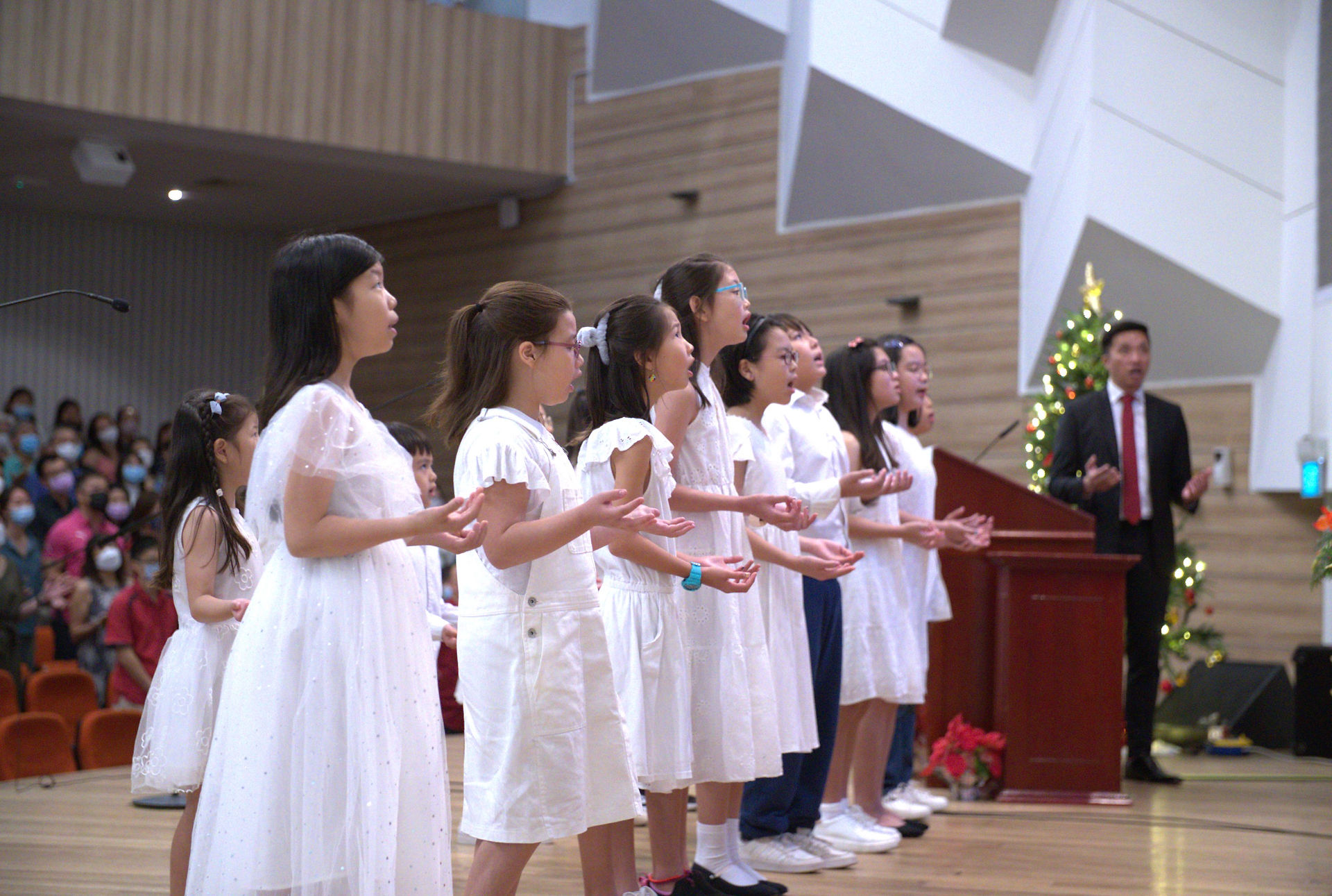 Covenant Kids singing during tithes and offerings segment, for CCMC Christmas Service 2023.