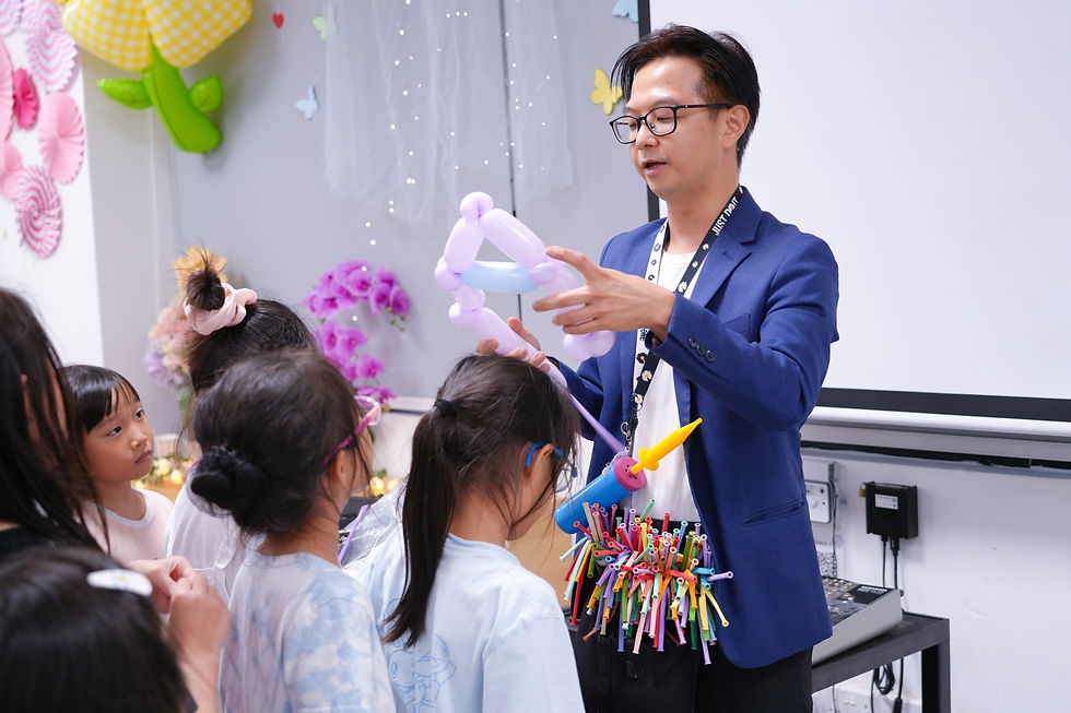 Excited children eagerly line up for their special artistic balloons after the thrilling show.