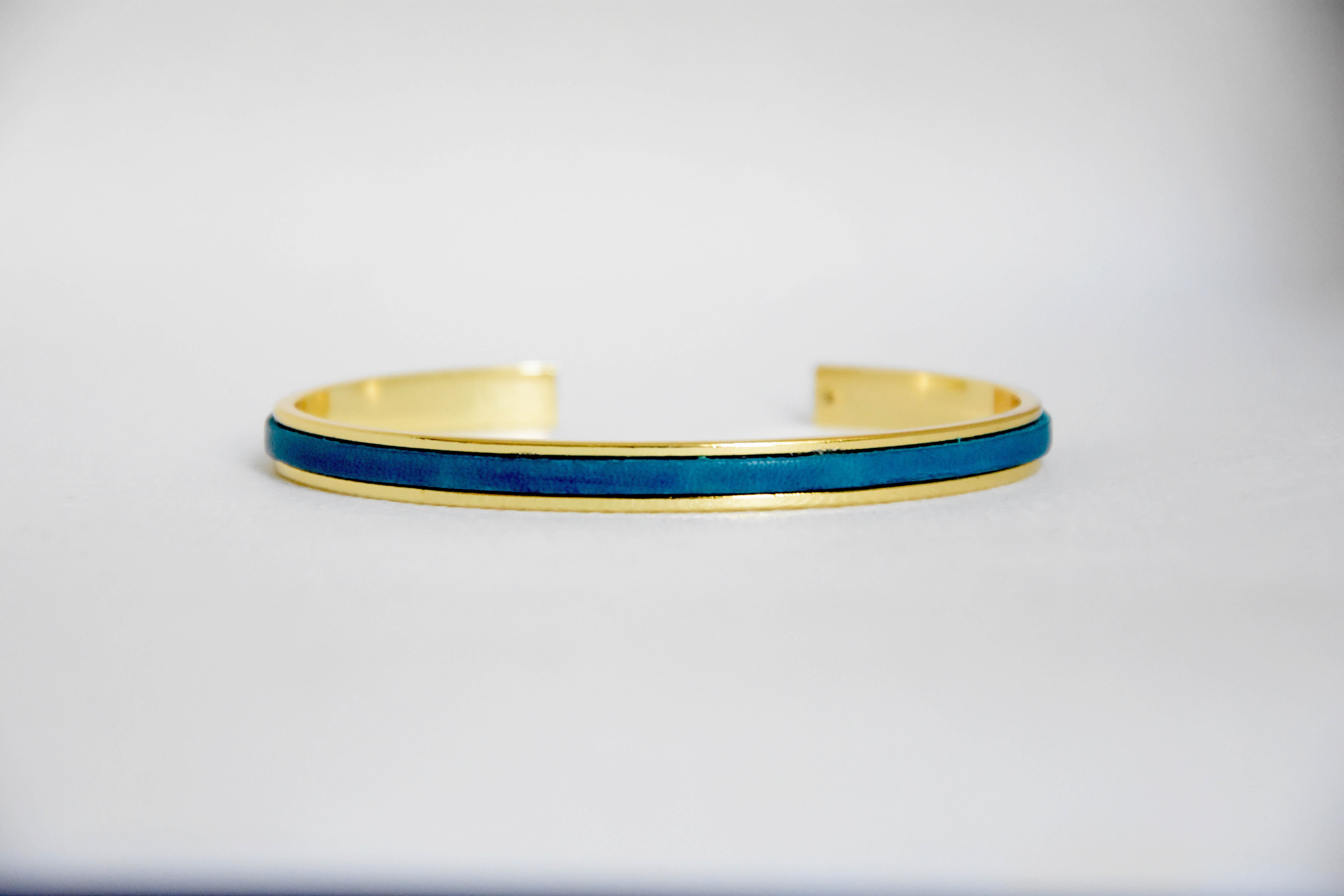 Minimaliste Bleu Lagon Doré