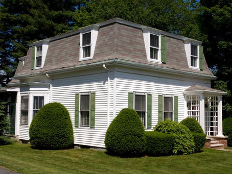 Cost Analysis: Mansard Roof Installation and Maintenance
