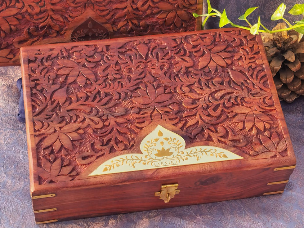 Thumbnail: Detailed floral motif carving on VARNIKA rosewood box lid showing deep relief craftsmanship and polished brass centerpiece