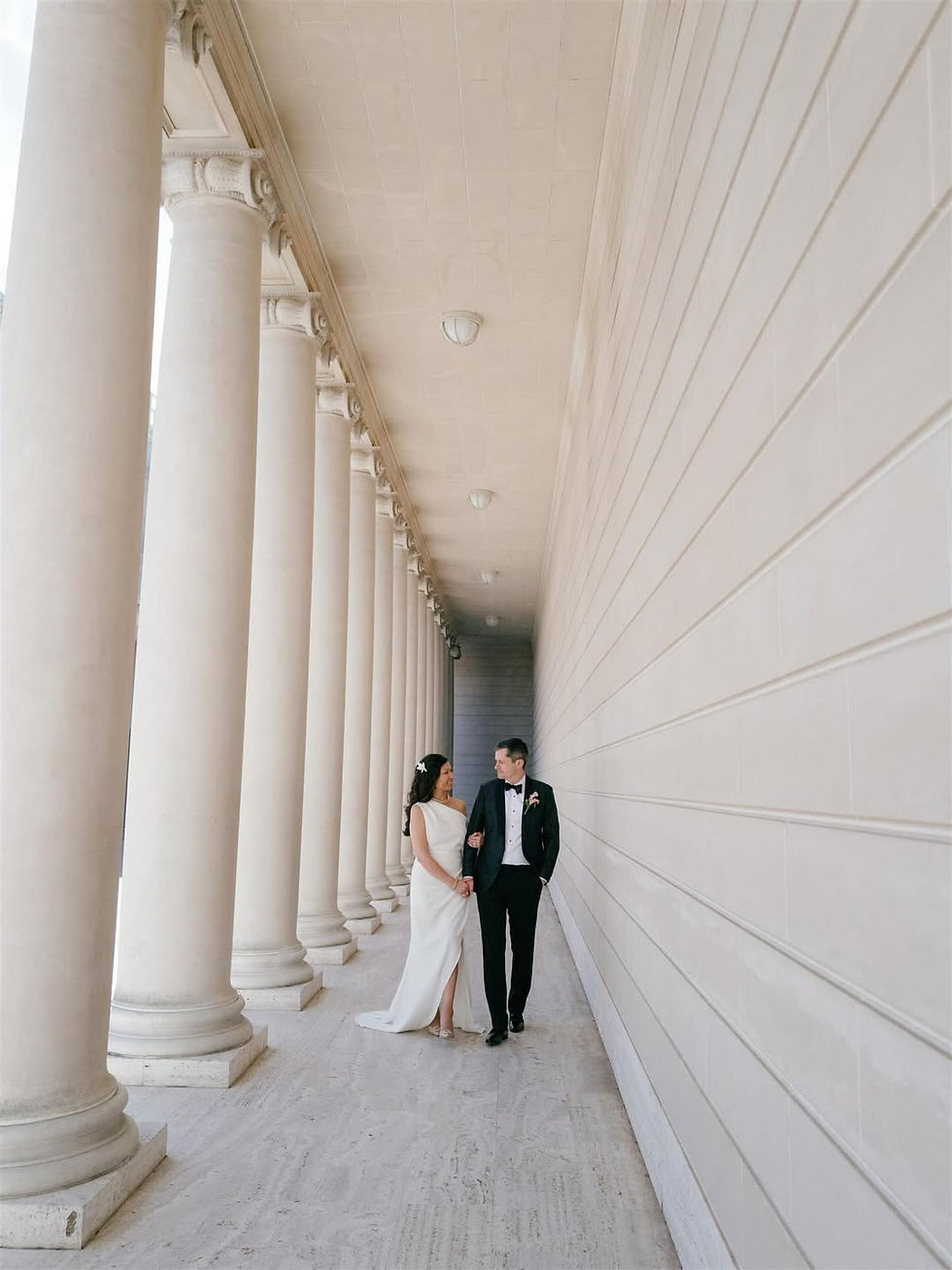 San Francisco wedding hairstyle by An Artistry soft waves bridal look walking through columns