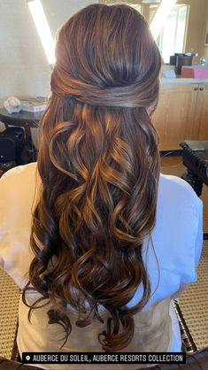 Long wedding hairstyle with cascading curls and half-up styling created by AN Artistry in Napa Valley.