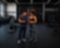 Starck Fitness personal trainer reviewing a custom workout plan with a client in Napervill