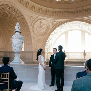 San Francisco City Hall wedding hairstyle by AN Artistry soft bridal waves during ceremony.