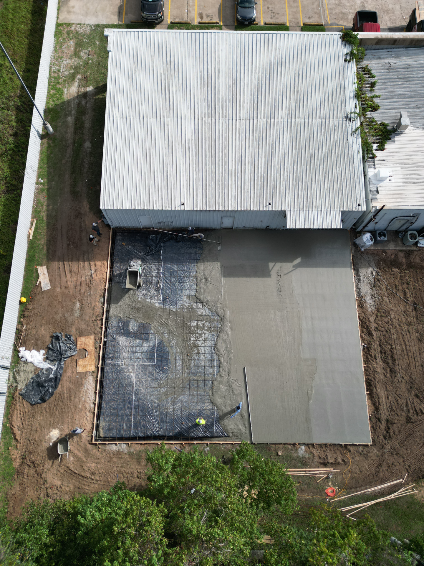 concrete pad being poured for commercial construction project and vet clinic in montgomery county, tx